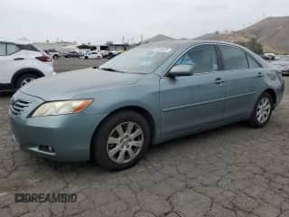 2009 Toyota Camry LE with VIN 4T1BK46K99U591353, listed as a Copart auction lot 61646425 with 141,070 mi miles and Salvage title. Bid and sale history available at DreamBid. Image 1.