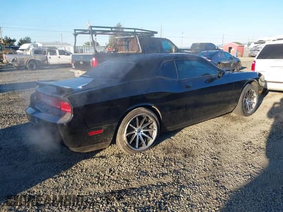 2013 Dodge Challenger R/T с VIN 2C3CDYBT1DH501055, выставлен на аукционе IAAI как лот 41424579 с пробегом 156 492 миль миль и . История ставок и продаж доступна на DreamBid. Изображение 4.