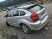 2009 Dodge Caliber SXT z VIN 1B3HB48A69D164622, wystawiony jako Copart lot #67573855 z przebiegiem Nie podano mil oraz Szkoda całkowita • Salvage title. Historia ofert i sprzedaży dostępna na DreamBid. Obrazek 2.