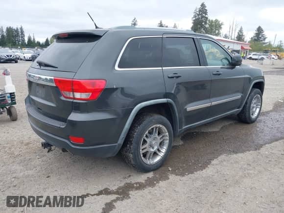 2011 Jeep Grand Cherokee 70th Anniversary with VIN 1J4RR4GG3BC582470, listed as a IAAI auction lot 42138291 with 241,429 mi miles and . Bid and sale history available at DreamBid. Image 4.