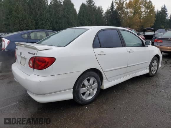 2004 Toyota Corolla S with VIN 1NXBR32E24Z242033, listed as a Copart auction lot 91136595 with 218,641 mi miles and Clean title. Bid and sale history available at DreamBid. Image 3.