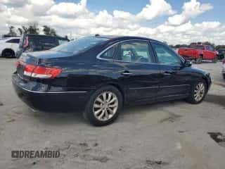 2007 Hyundai Azera SE с VIN KMHFC46F77A230168, выставлен на аукционе Copart как лот 72891584 с пробегом 119 853 миль миль и Списание • Salvage title. История ставок и продаж доступна на DreamBid. Изображение 3.