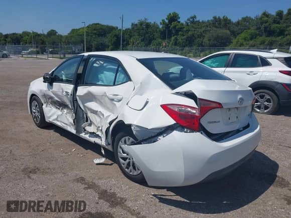 2019 Toyota Corolla L with VIN 2T1BURHE5KC230711, listed as a IAAI auction lot 43261314 with 88,638 mi miles and . Bid and sale history available at DreamBid. Image 3.