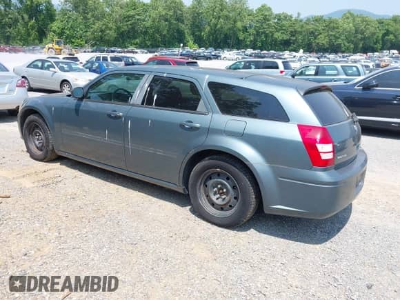 2005 Dodge Magnum SE with VIN 2D4FV48T35H624544, listed as a IAAI auction lot 42405272 with 245,529 mi miles and . Bid and sale history available at DreamBid. Image 3.