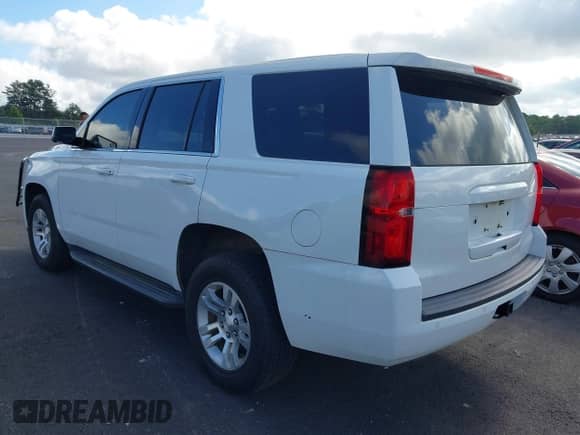 2017 Chevrolet Tahoe Commercial with VIN 1GNSKFECXHR217305, listed as a IAAI auction lot 42522868 with 209,194 mi miles and . Bid and sale history available at DreamBid. Image 3.