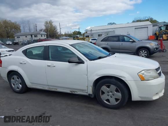2010 Dodge Avenger SXT with VIN 1B3CC4FB1AN184830, listed as a IAAI auction lot 43525764 with 135,610 mi miles and . Bid and sale history available at DreamBid. Image 6.