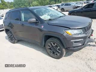 2019 Jeep Compass Trailhawk with VIN 3C4NJDDB6KT671166, listed as a IAAI auction lot 42936788 with 124,947 mi miles and . Bid and sale history available at DreamBid. Image 1.