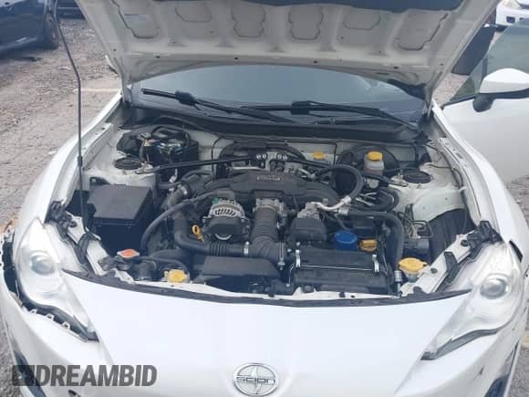 2014 Scion FR-S z VIN JF1ZNAA1XE9705936, wystawiony jako IAAI lot #42641834 z przebiegiem 86 705 mil mil oraz . Historia ofert i sprzedaży dostępna na DreamBid. Obrazek 10.