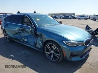 2020 BMW 3 Series 330i with VIN WBA5R1C02LFJ20152, listed as a IAAI auction lot 42443436 with 63,454 mi miles and . Bid and sale history available at DreamBid. Image 1.