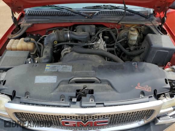 2002 GMC Sierra 1500 z VIN 1GTEC14W52Z338669, wystawiony jako Copart lot #53890055 z przebiegiem Nie podano mil oraz Szkoda całkowita • Salvage title. Historia ofert i sprzedaży dostępna na DreamBid. Obrazek 11.