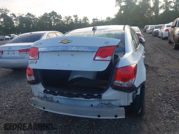 2015 Chevrolet Cruze LT z VIN 1G1PE5SB0F7290972, wystawiony jako IAAI lot #43078116 z przebiegiem Nie podano mil oraz . Historia ofert i sprzedaży dostępna na DreamBid. Obrazek 6.