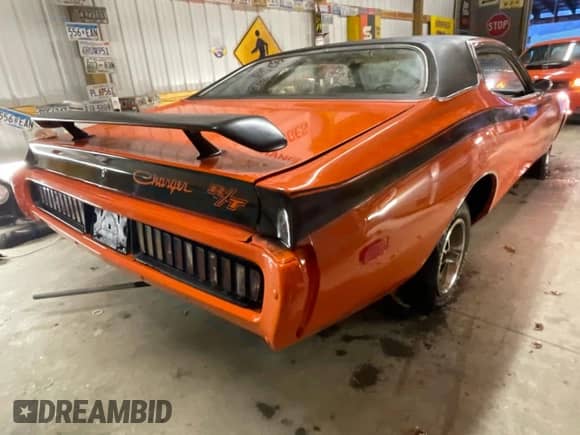 1973 Dodge Charger z VIN WH23G3A155435, wystawiony jako Copart lot #90740485 z przebiegiem 11 462 mil mil oraz Czysty tytuł • Clean title. Historia ofert i sprzedaży dostępna na DreamBid. Obrazek 4.