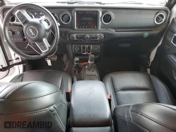 2022 Jeep Wrangler Unlimited Sahara with VIN 1C4JJXP62NW266791, listed as a Copart auction lot 64863535 with 61,452 mi miles and Salvage title. Bid and sale history available at DreamBid. Image 8.