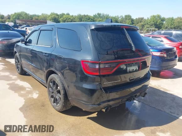 2015 Dodge Durango R/T with VIN 1C4SDHCTXFC147371, listed as a IAAI auction lot 43389347 with 172,490 mi miles and . Bid and sale history available at DreamBid. Image 3.
