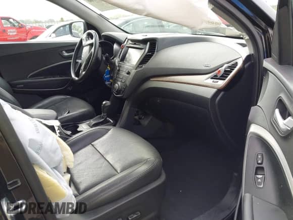 2018 Hyundai Santa Fe 2.0T with VIN 5NMZUDLA3JH057978, listed as a IAAI auction lot 41930580 with 118,100 mi miles and . Bid and sale history available at DreamBid. Image 5.