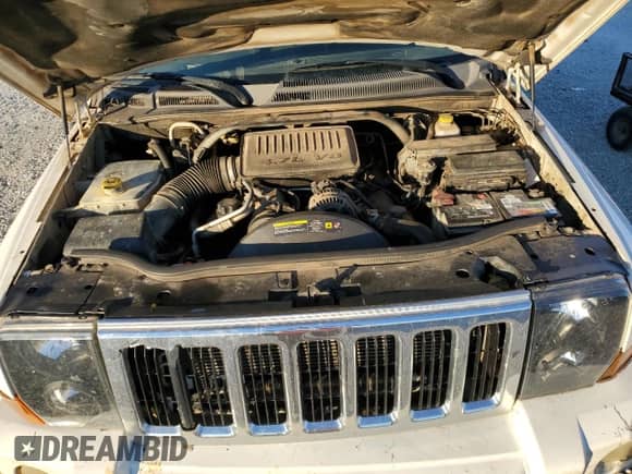 2006 Jeep Commander with VIN 1J8HH48N86C168763, listed as a Copart auction lot 88930175 with 289,933 mi miles and Salvage title. Bid and sale history available at DreamBid. Image 12.