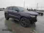 2016 Jeep Grand Cherokee High Altitude with VIN 1C4RJECG8GC500359, listed as a Copart auction lot 45288245 with 83,123 mi miles and Salvage title. Bid and sale history available at DreamBid. Image 4.