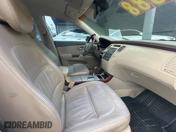 2006 Hyundai Azera SE с VIN KMHFC46F06A115488, выставлен на аукционе Copart как лот 87750745 с пробегом 159 677 миль миль и Чистый • Clean title. История ставок и продаж доступна на DreamBid. Изображение 5.