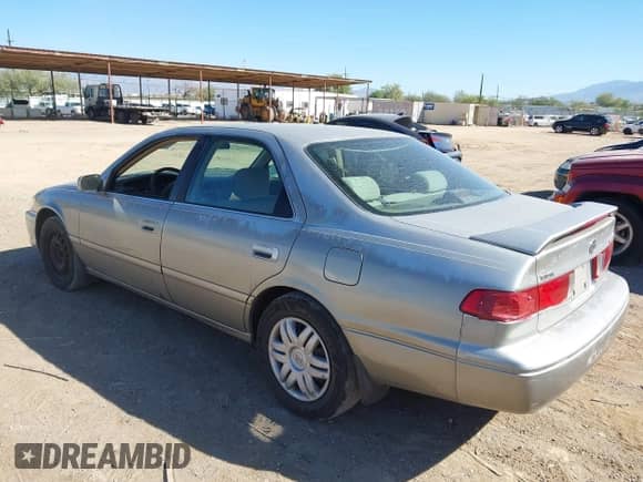 2001 Toyota Camry LE with VIN JT2BG22K210535291, listed as a IAAI auction lot 43530605 with 193,735 mi miles and . Bid and sale history available at DreamBid. Image 3.