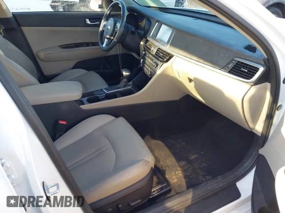 2016 Kia Optima EX z VIN 5XXGU4L32GG022526, wystawiony jako IAAI lot #43258035 z przebiegiem 39 849 mil mil oraz . Historia ofert i sprzedaży dostępna na DreamBid. Obrazek 5.