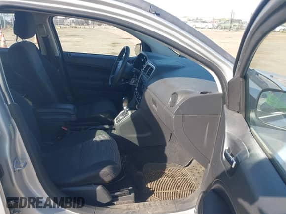 2010 Dodge Caliber SXT with VIN 1B3CB4HA4AD661148, listed as a IAAI auction lot 43507699 with 186,140 mi miles and . Bid and sale history available at DreamBid. Image 5.