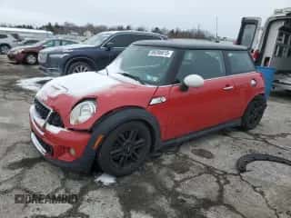 2013 MINI Hardtop S with VIN WMWSV3C56DT389389, listed as a Copart auction lot 89288615 with 85,001 mi miles and Salvage title. Bid and sale history available at DreamBid. Image 1.