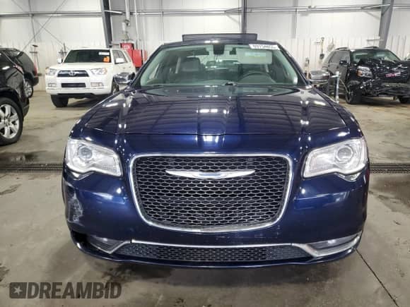 2015 Chrysler 300 C с VIN 2C3CCAEG2FH920771, выставлен на аукционе Copart как лот 69754855 с пробегом 125 939 миль миль и Списание • Salvage title. История ставок и продаж доступна на DreamBid. Изображение 5.