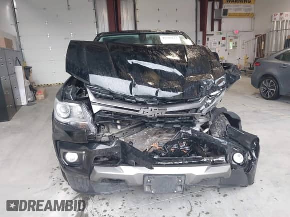 2022 Chevrolet Colorado 4WD Z71 z VIN 1GCGTDENXN1323376, wystawiony jako IAAI lot #42309817 z przebiegiem 56 229 mil mil oraz . Historia ofert i sprzedaży dostępna na DreamBid. Obrazek 12.