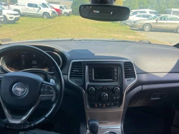 2017 Jeep Grand Cherokee Laredo с VIN 1C4RJFAG5HC771809, выставлен на аукционе Copart как лот 71249125 с пробегом 169 000 миль миль и Чистый • Clean title. История ставок и продаж доступна на DreamBid. Изображение 9.