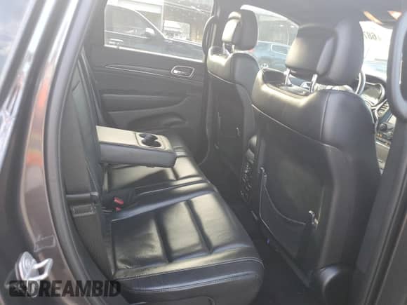 2017 Jeep Grand Cherokee Limited с VIN 1C4RJEBG9HC887703, выставлен на аукционе Copart как лот 68774725 с пробегом 94 885 миль миль и Списание • Salvage title. История ставок и продаж доступна на DreamBid. Изображение 10.