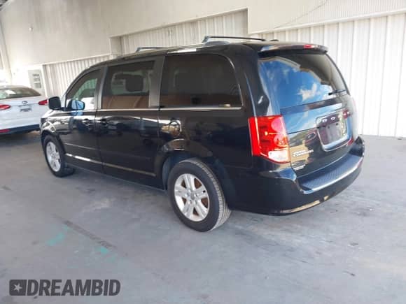 2013 Dodge Grand Caravan Crew with VIN 2C4RDGDG8DR693522, listed as a IAAI auction lot 43275399 with 144,142 mi miles and . Bid and sale history available at DreamBid. Image 3.