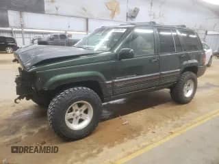 1995 Jeep Grand Cherokee Limited z VIN 1J4GZ78S7SC766726, wystawiony jako Copart lot #84909134 z przebiegiem 174 256 mil mil oraz Szkoda całkowita • Salvage title. Historia ofert i sprzedaży dostępna na DreamBid. Obrazek 1.