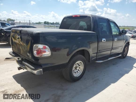 2002 Ford F-150 XLT с VIN 1FTRW07L22KB04146, выставлен на аукционе Copart как лот 69320515 с пробегом 189 839 миль миль и Списание • Salvage title. История ставок и продаж доступна на DreamBid. Изображение 3.