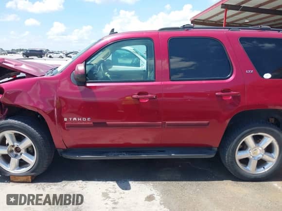 2007 Chevrolet Tahoe LT with VIN 1GNFK13077R184209, listed as a IAAI auction lot 42714223 with 182,011 mi miles and . Bid and sale history available at DreamBid. Image 14.