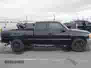 2004 GMC Sierra 1500 with VIN 1GTEC19X04Z338308, listed as a IAAI auction lot 42429809 with 216,056 mi miles and . Bid and sale history available at DreamBid. Image 13.