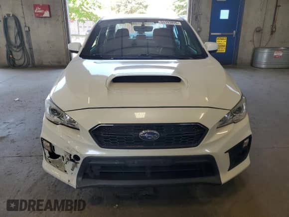 2021 Subaru WRX with VIN JF1VA1A6XM9818869, listed as a Copart auction lot 55393895 with 73,385 mi miles and Salvage title. Bid and sale history available at DreamBid. Image 5.