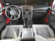 2008 Jeep Wrangler Unlimited X with VIN 1J4GA39168L507899, listed as a Copart auction lot 84404775 with 99,888 mi miles and Salvage title. Bid and sale history available at DreamBid. Image 8.