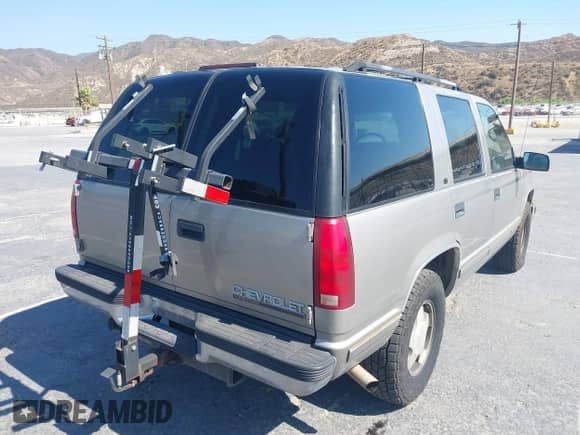 1999 Chevrolet Tahoe Z71 with VIN 1GNEK13R0XJ528438, listed as a IAAI auction lot 42761532 with 235,135 mi miles and . Bid and sale history available at DreamBid. Image 4.