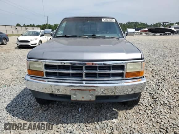 1993 Dodge Dakota z VIN 1B7GG23YXPS240792, wystawiony jako Copart lot #54324035 z przebiegiem 137 028 mil mil oraz Szkoda całkowita • Salvage title. Historia ofert i sprzedaży dostępna na DreamBid. Obrazek 5.