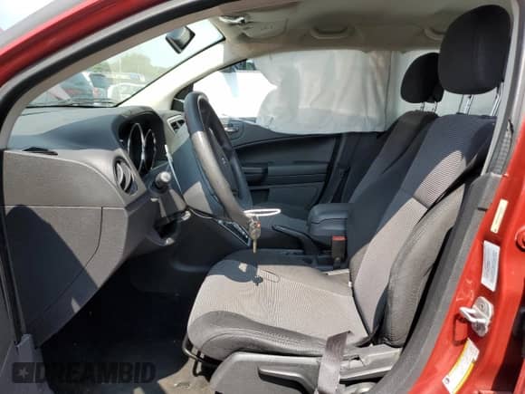 2010 Dodge Caliber Mainstreet z VIN 1B3CB3HA9AD642069, wystawiony jako Copart lot #67555465 z przebiegiem Nie podano mil oraz Szkoda całkowita • Salvage title. Historia ofert i sprzedaży dostępna na DreamBid. Obrazek 7.