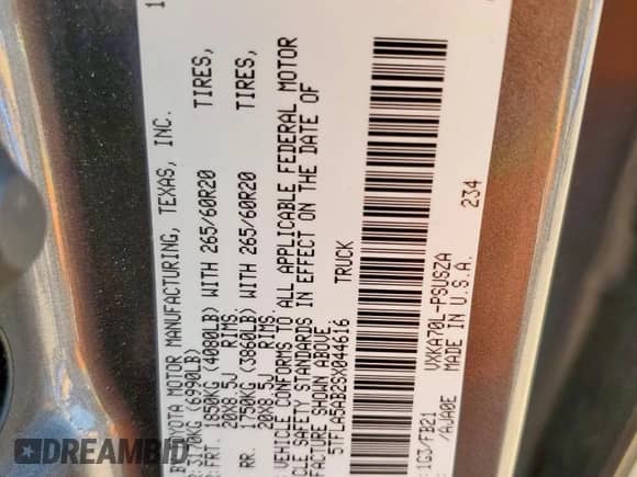 2025 Toyota Tundra SR with VIN 5TFLA5AB2SX044616, listed as a Copart auction lot 82146585 with 12,721 mi miles and Salvage title. Bid and sale history available at DreamBid. Image 12.