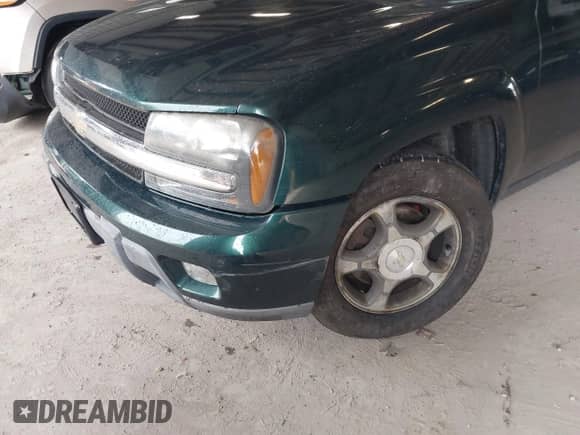 2006 Chevrolet TrailBlazer LS z VIN 1GNET16SX66110417, wystawiony jako IAAI lot #42823502 z przebiegiem 131 013 mil mil oraz . Historia ofert i sprzedaży dostępna na DreamBid. Obrazek 6.