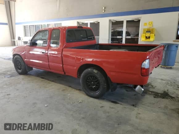 1997 Toyota Tacoma z VIN 4TAVL52N6VZ291508, wystawiony jako Copart lot #82747565 z przebiegiem 233 670 mil mil oraz Szkoda całkowita • Salvage title. Historia ofert i sprzedaży dostępna na DreamBid. Obrazek 2.