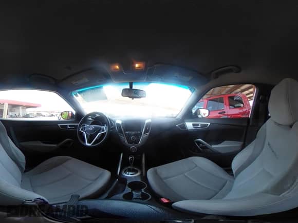 2014 Hyundai Veloster with VIN KMHTC6ADXEU209850, listed as a IAAI auction lot 42726384 with 128,523 mi miles and . Bid and sale history available at DreamBid. Image 18.