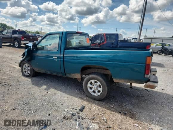 1997 Nissan Frontier XE with VIN 1N6SD11S5VC336667, listed as a Copart auction lot 64675695 with 179,754 mi miles and Salvage title. Bid and sale history available at DreamBid. Image 2.