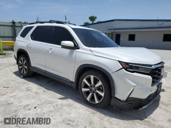 2023 Honda Pilot Elite с VIN 5FNYG1H80PB009677, выставлен на аукционе Copart как лот 62694475 с пробегом 33 436 миль миль и Списание • Salvage title. История ставок и продаж доступна на DreamBid. Изображение 4.
