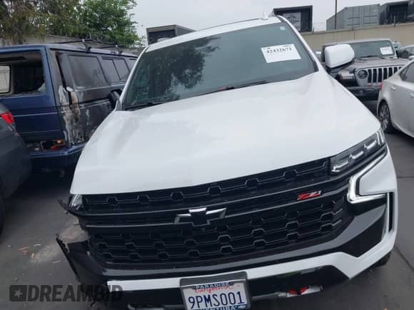 2024 Chevrolet Tahoe Z71 z VIN 1GNSKPKD6RR415433, wystawiony jako IAAI lot #42432671 z przebiegiem 6 633 mil mil oraz . Historia ofert i sprzedaży dostępna na DreamBid. Obrazek 13.