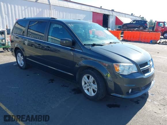 2012 Dodge Grand Caravan Crew z VIN 2C4RDGDGXCR298854, wystawiony jako IAAI lot #42736455 z przebiegiem 112 968 mil mil oraz . Historia ofert i sprzedaży dostępna na DreamBid. Obrazek 1.