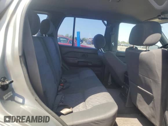 1999 Nissan Pathfinder XE with VIN JN8AR05Y0XW303736, listed as a Copart auction lot 53698945 with 222,352 mi miles and Clean title. Bid and sale history available at DreamBid. Image 11.