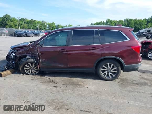 2021 Honda Pilot EX-L z VIN 5FNYF5H55MB032982, wystawiony jako IAAI lot #42511656 z przebiegiem 104 018 mil mil oraz . Historia ofert i sprzedaży dostępna na DreamBid. Obrazek 14.